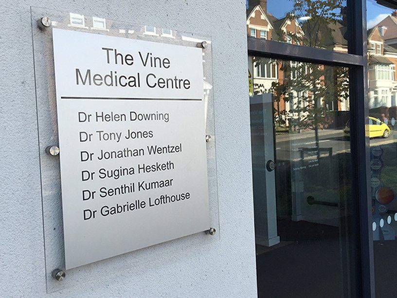 Clear acrylic and silver anodised aluminium Doctors Directory Sign