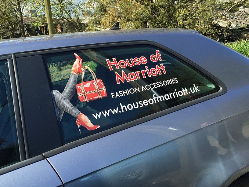 Advertising graphics for car windows