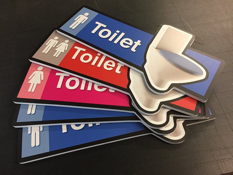 A selection of pictorial toilet sign designed for use on dementia wards