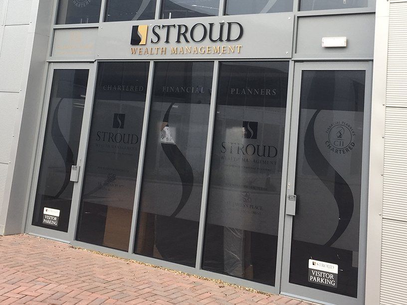 Exterior signage and frosted window graphics for office building