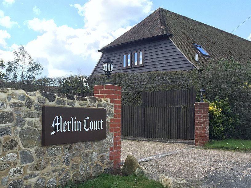 Powder coated sign tray for house