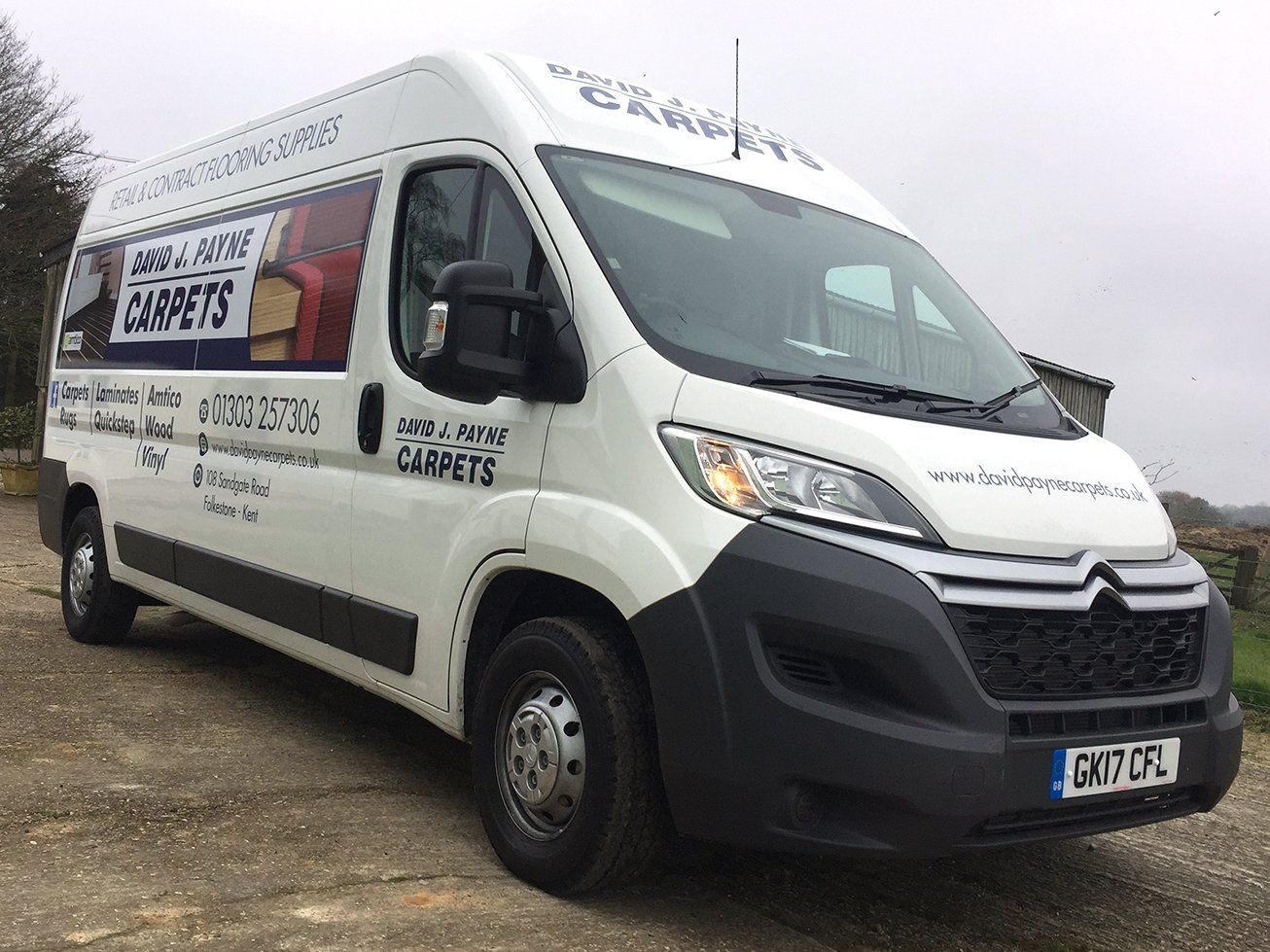 Vehicle graphics for carpet company