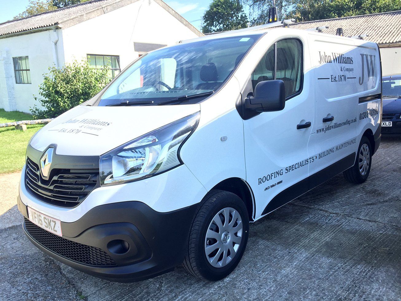 Vehicle graphics for roofing company