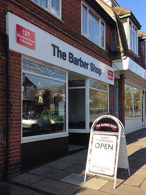 Fascia sign, window graphics and pavement sign