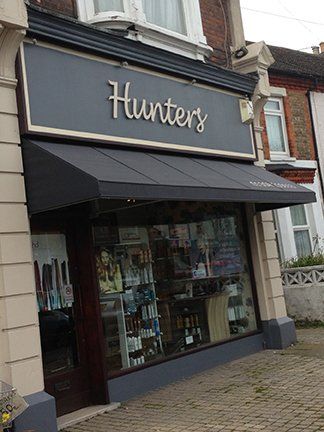 Cream acrylic leters on stand off fixings