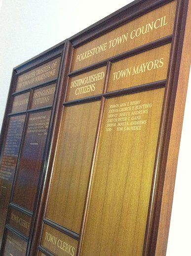 Commemorative board with gold leaf signwritten text