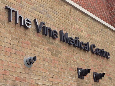 Painted built up steel letters on stand off fixings