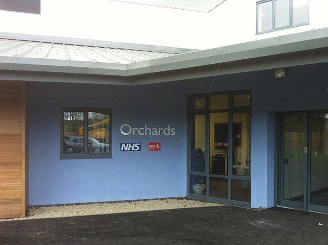 Acrylic lettering and signs on stand-off fixings