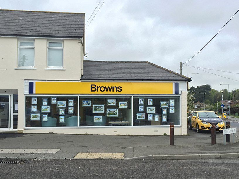 Powder coated sign tray with blue acrylic lettering