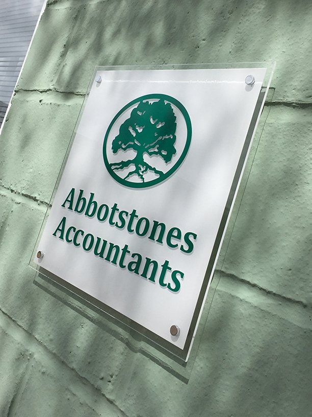 Clear acrylic sign on metal stand-off fixings