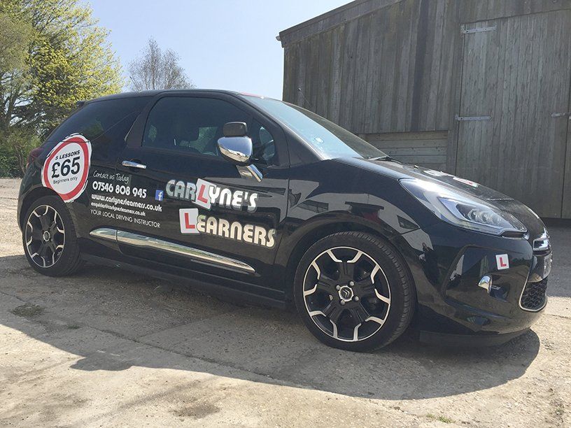Vinyl graphics for driving school car