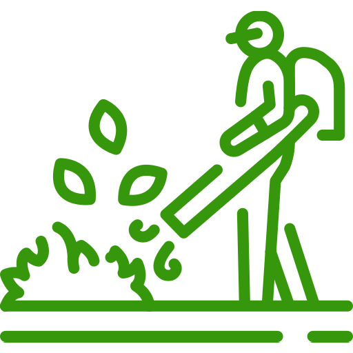 Green icon of a person using a backpack leaf blower to move a pile of leaves.