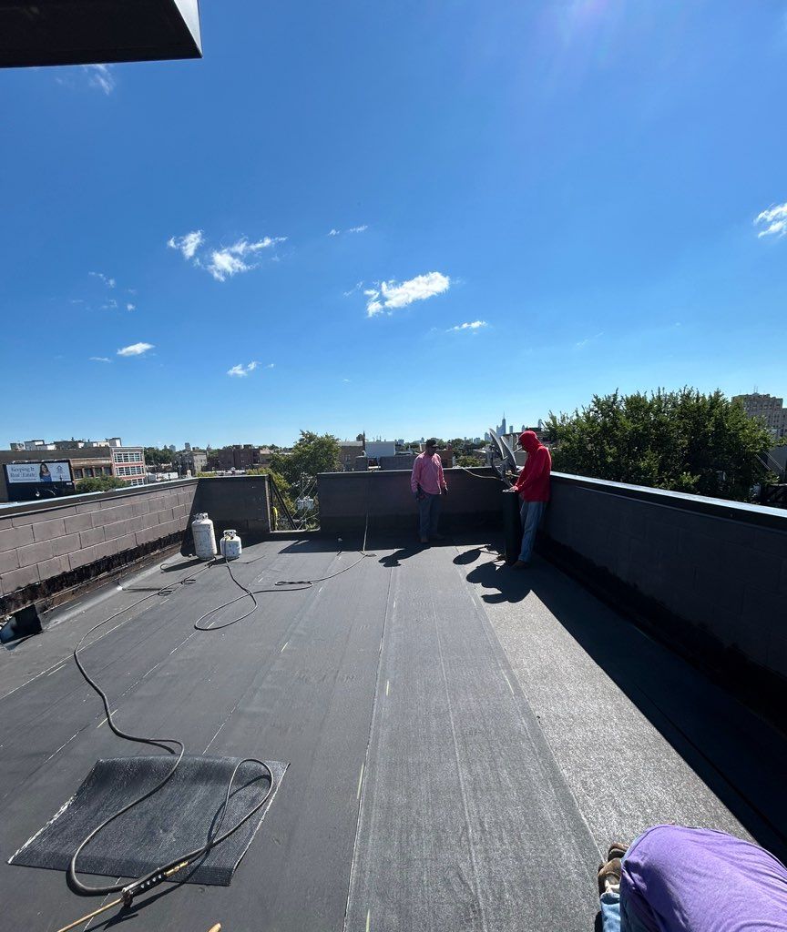 A ladder is attached to the side of a building.