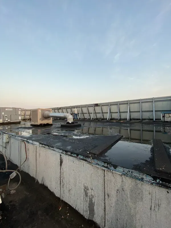 A rooftop with a lot of water on it