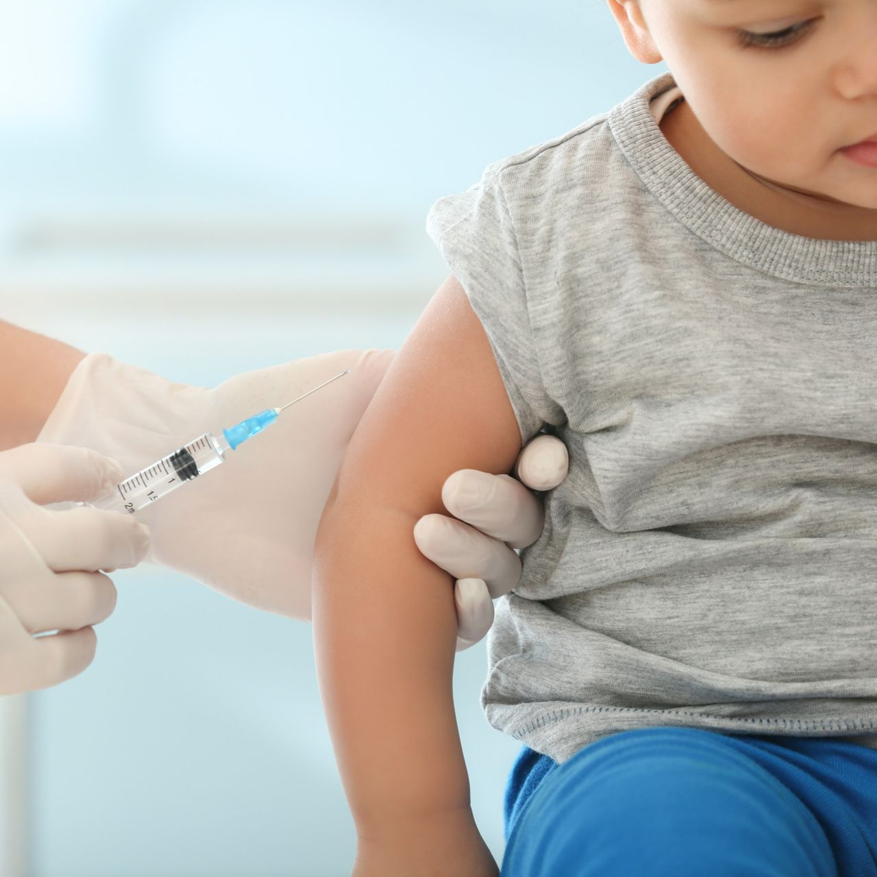 Child receiving a flu vaccination at Ashworths Clinic Ashford.