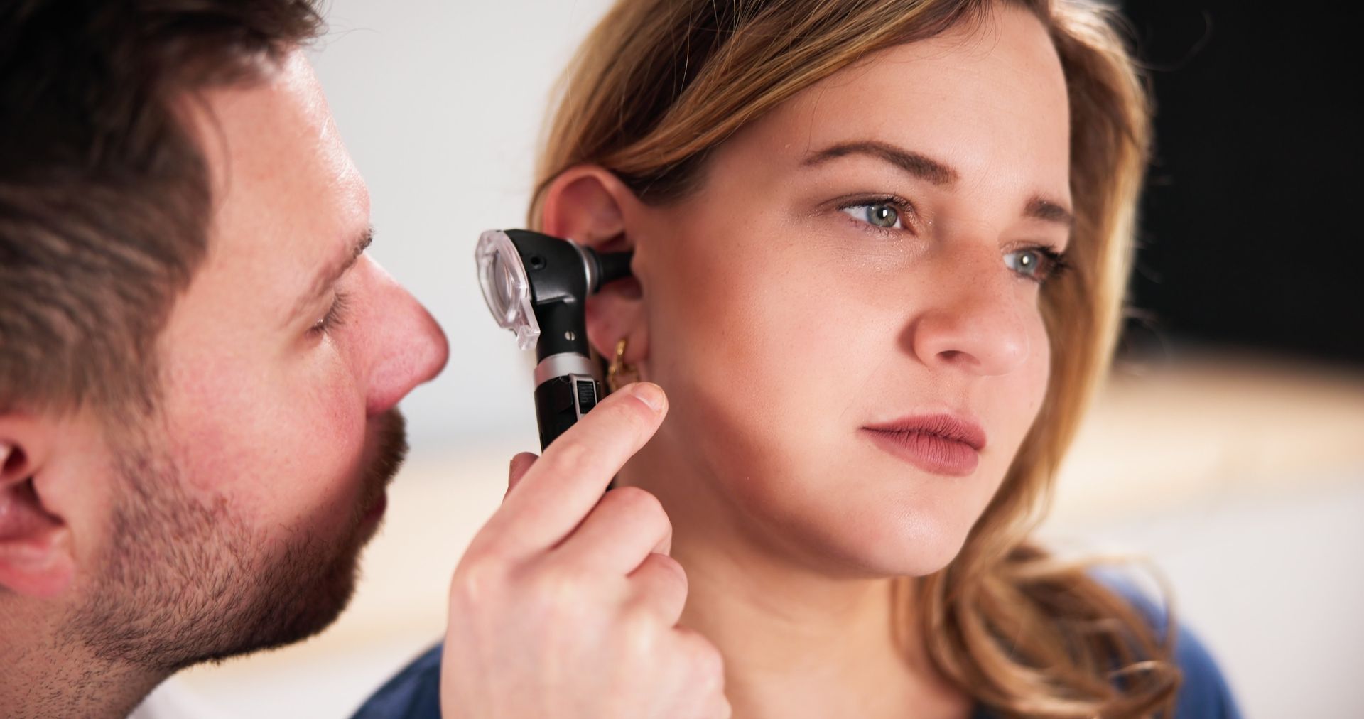 Ear examination before wax removal at Ashworths Clinic Ashford.