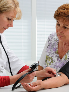 A patient getting a blood pressure check at Ashworths Clinic in Ashford, Kent.