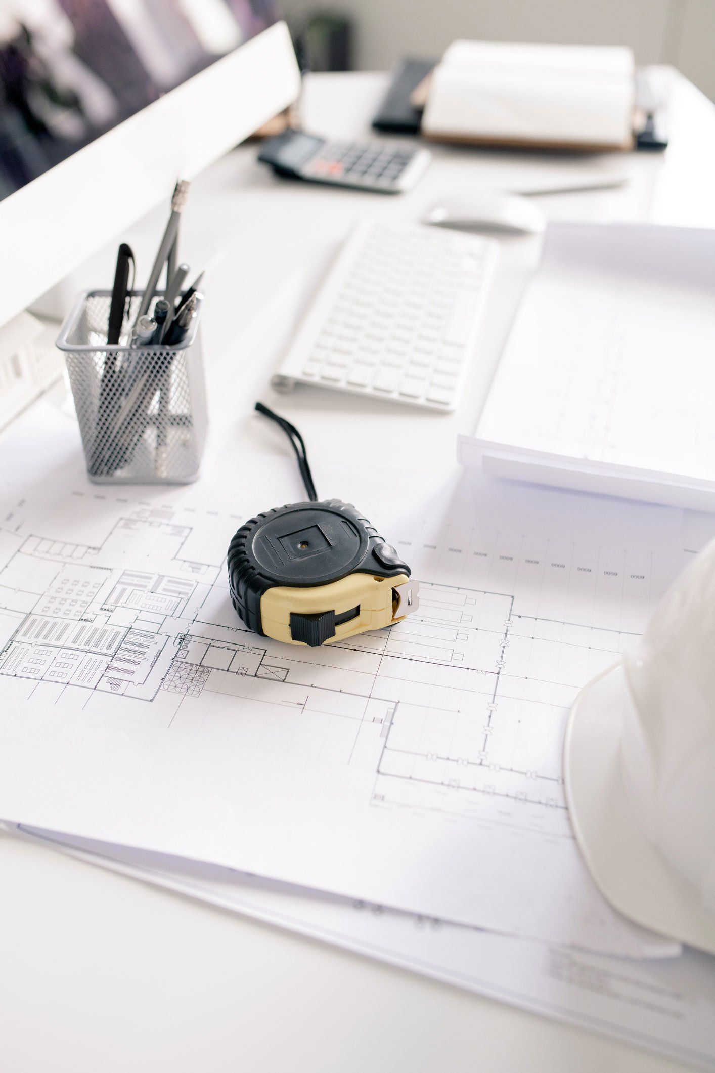 Blueprints and Measuring Tape on the Table — Charlotte, NC — Structural Design Solutions