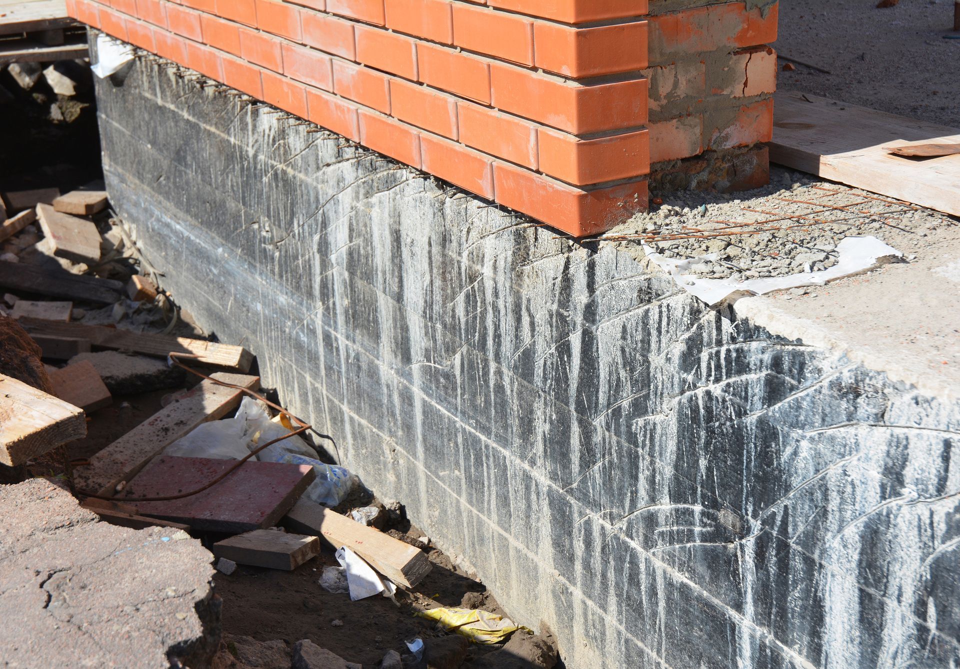 House foundation waterproofing showcased during professional foundation inspection.