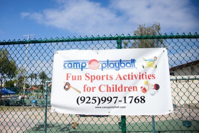 A sign for camp playball fun sports activities for children