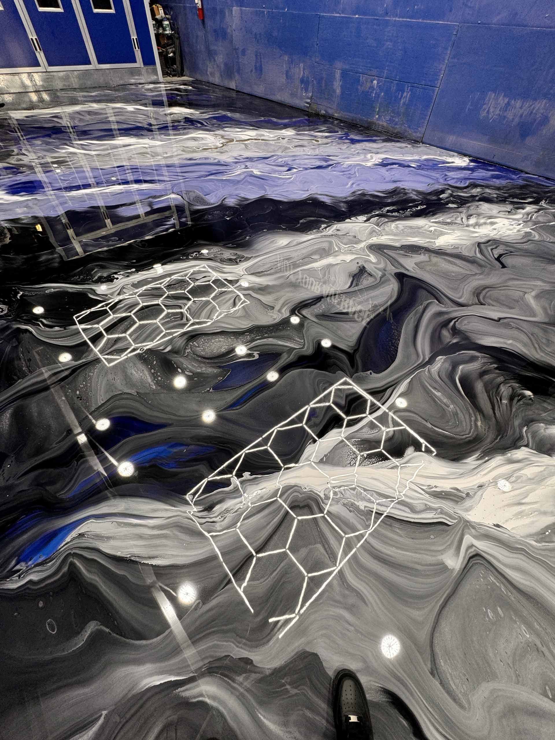 A Person Is Standing on A Epoxy Metallic Flooring — Honolulu, HI — Maneja Epoxy Resin 