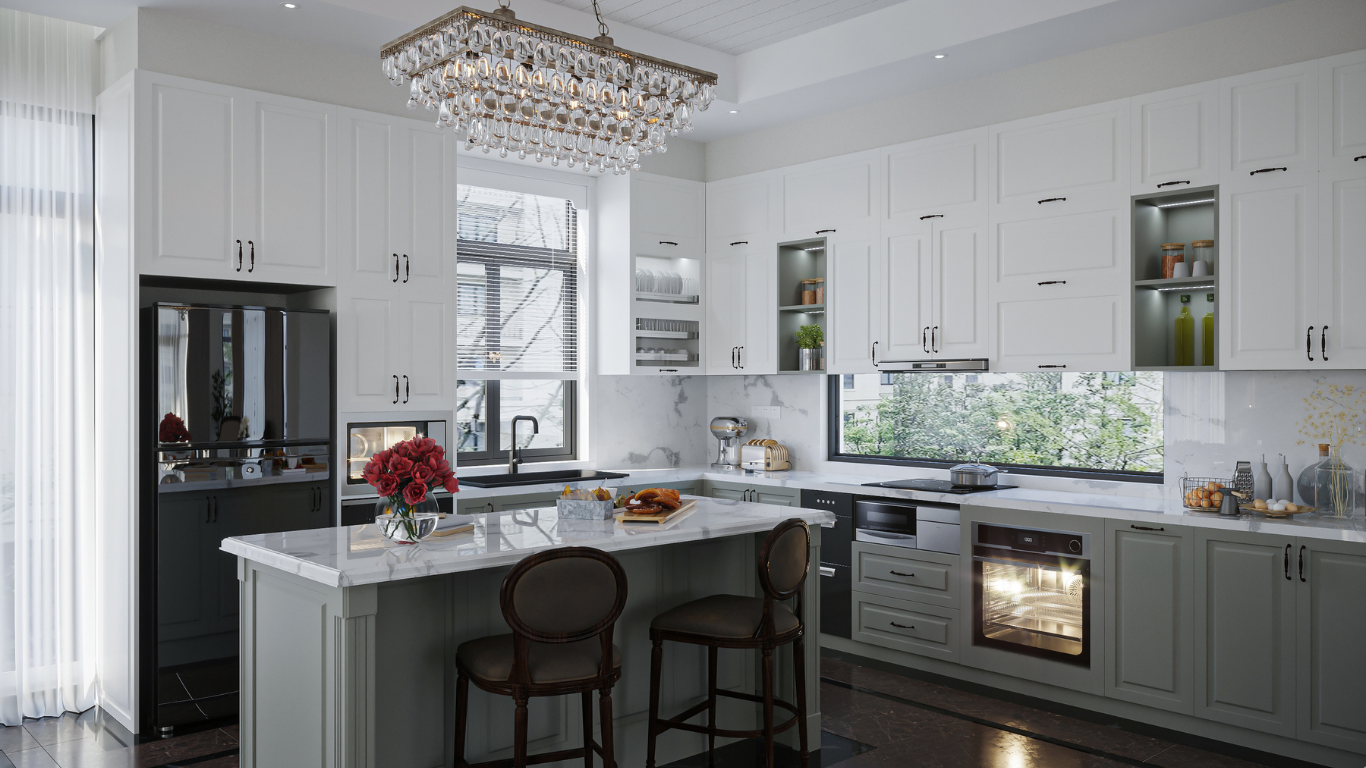 A kitchen with white cabinets , black appliances , a large island , and a chandelier.