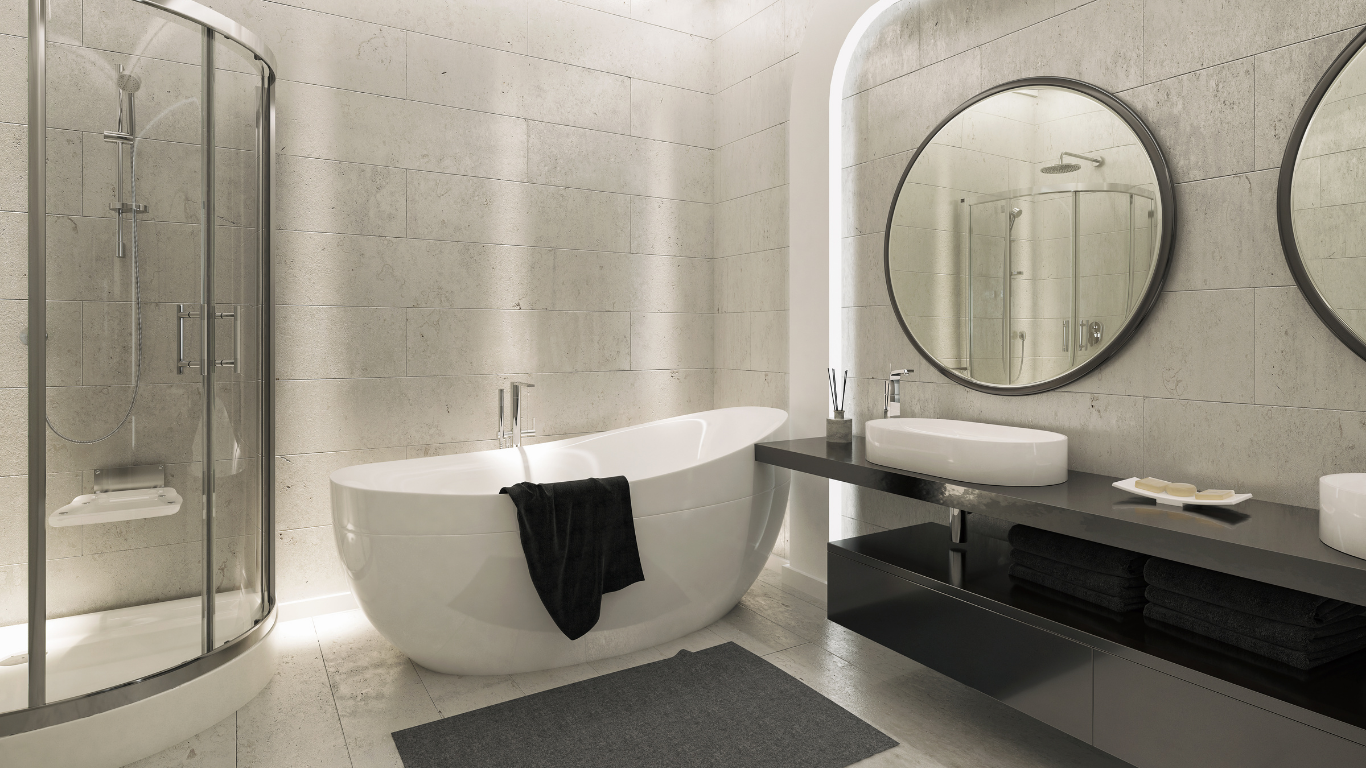 A bathroom with a bathtub , sink , shower and two mirrors.