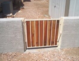 Black Iron Gate — Customized Wood and Iron Pool Fence in Mesa, AZ