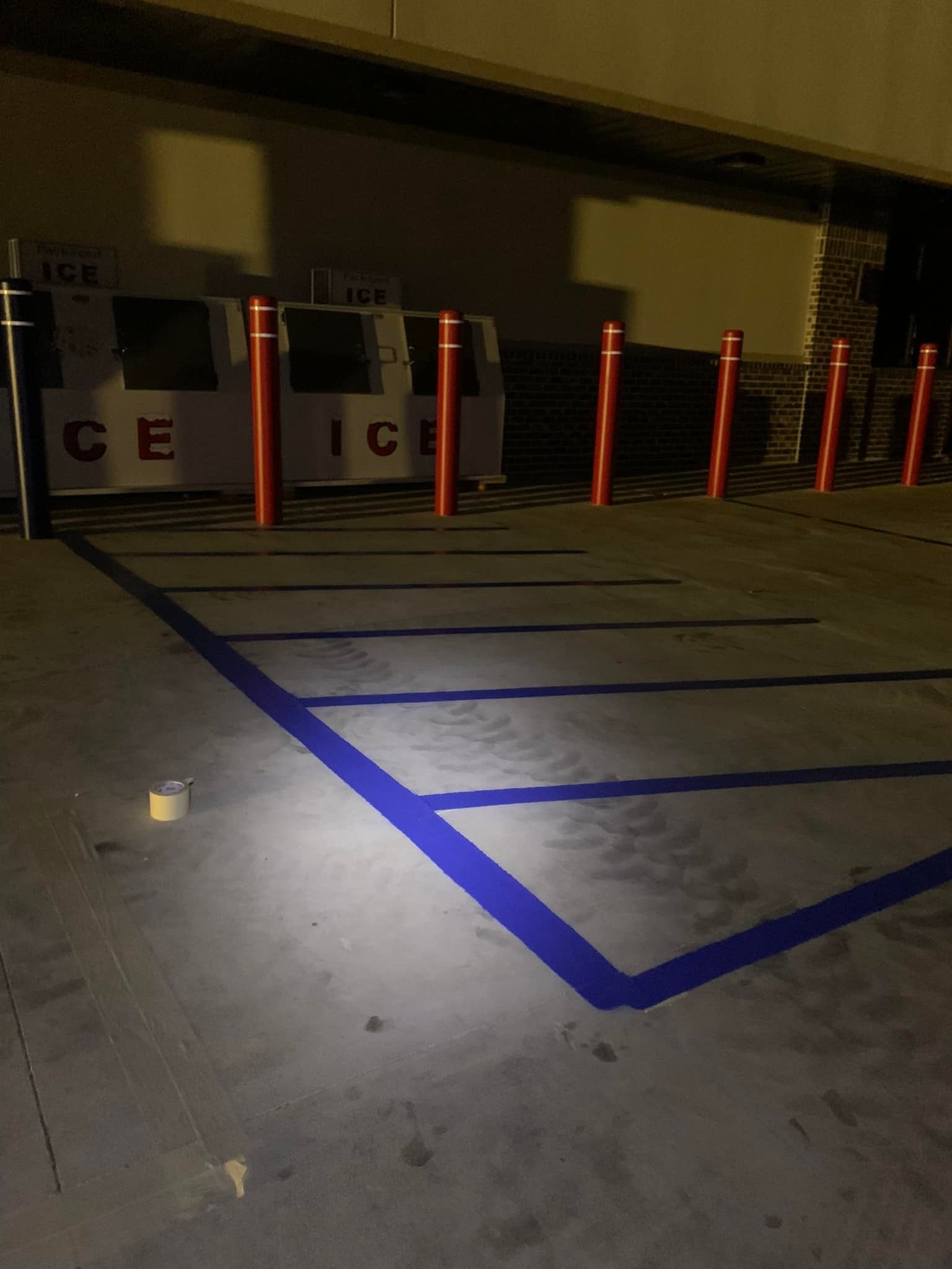 A parking lot with a sign that says police on it