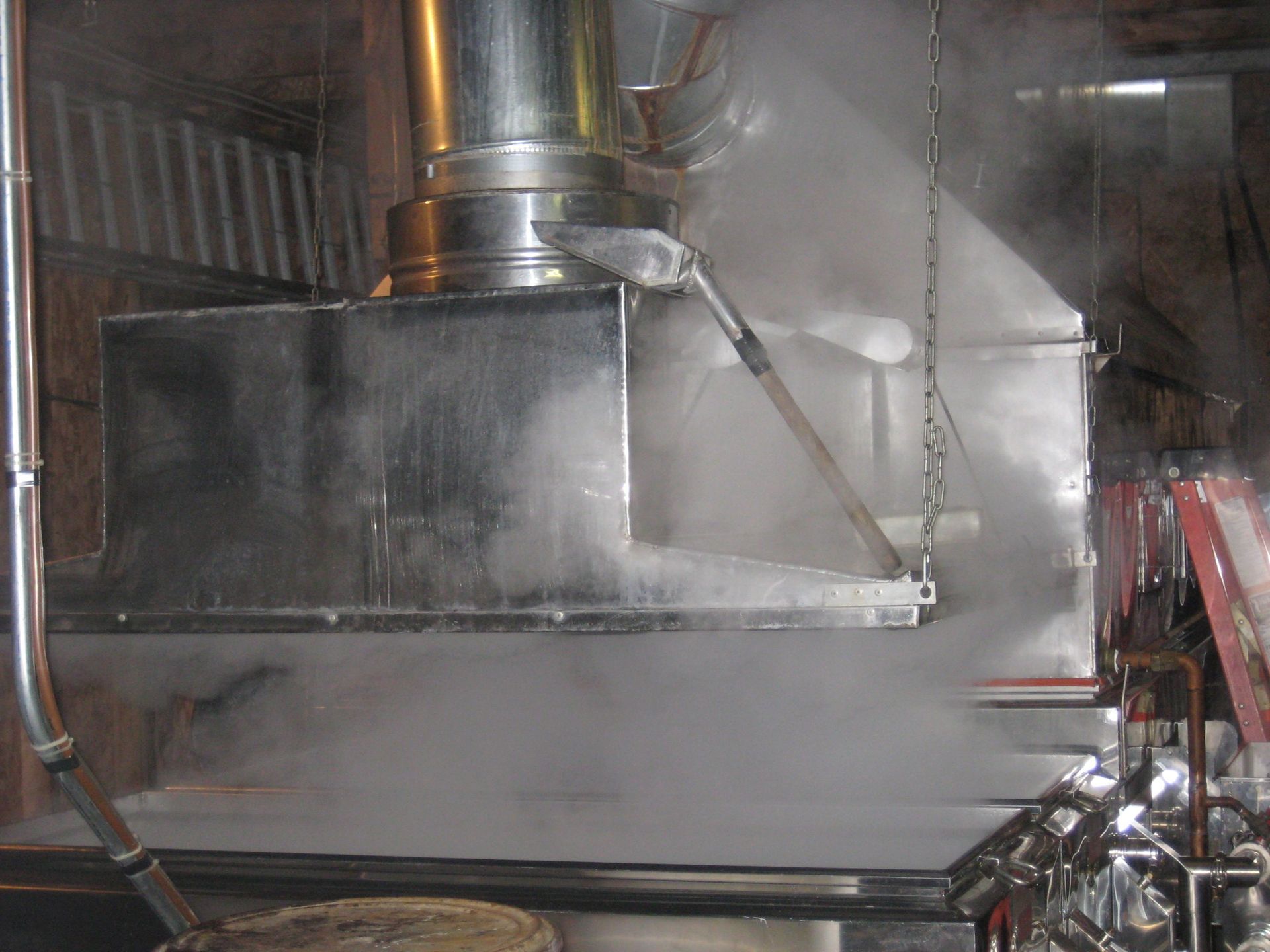 Eriks Sugarbush boiling maple syrup in VT