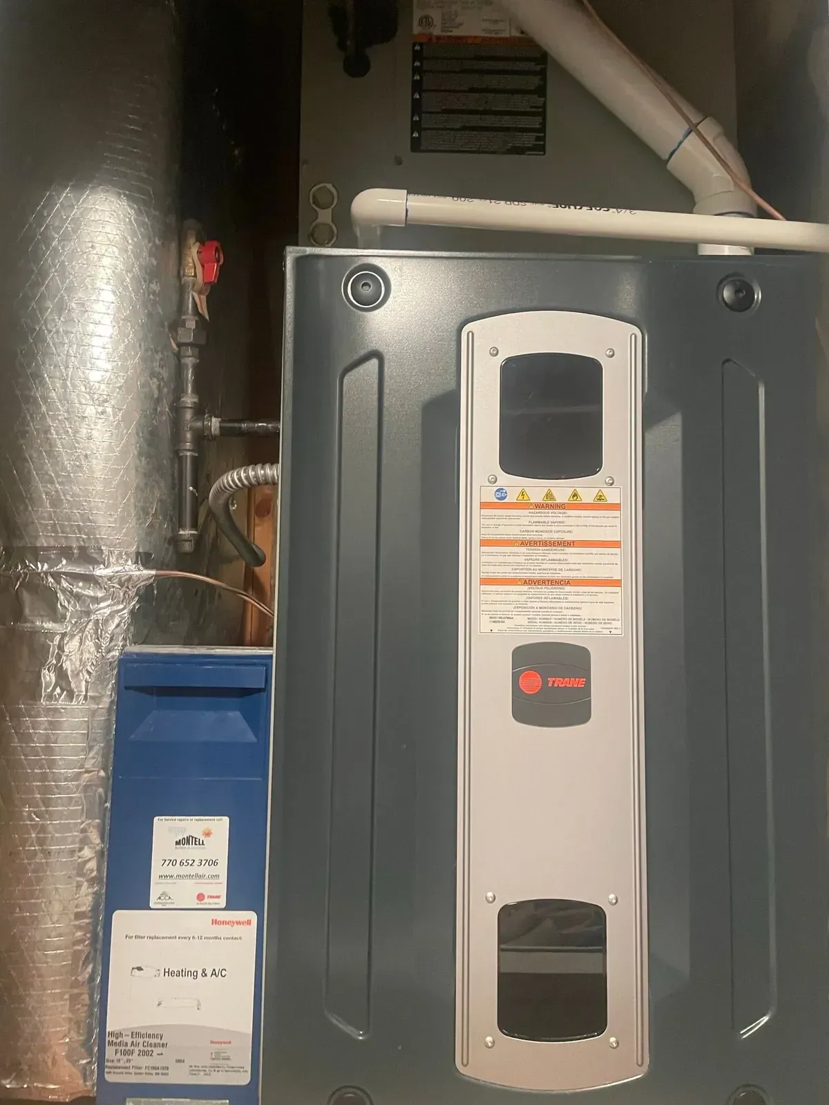 A picture of an air conditioner in a house.