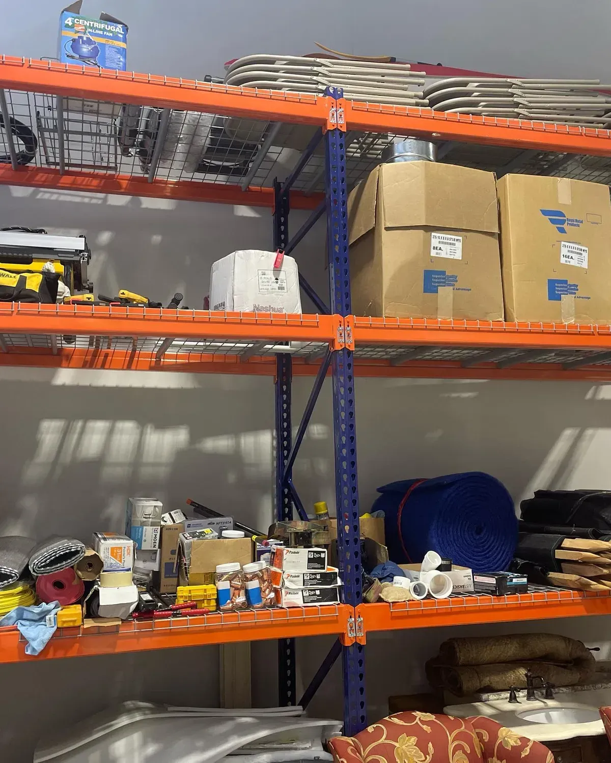 A warehouse filled with shelves and boxes with the letter p on them