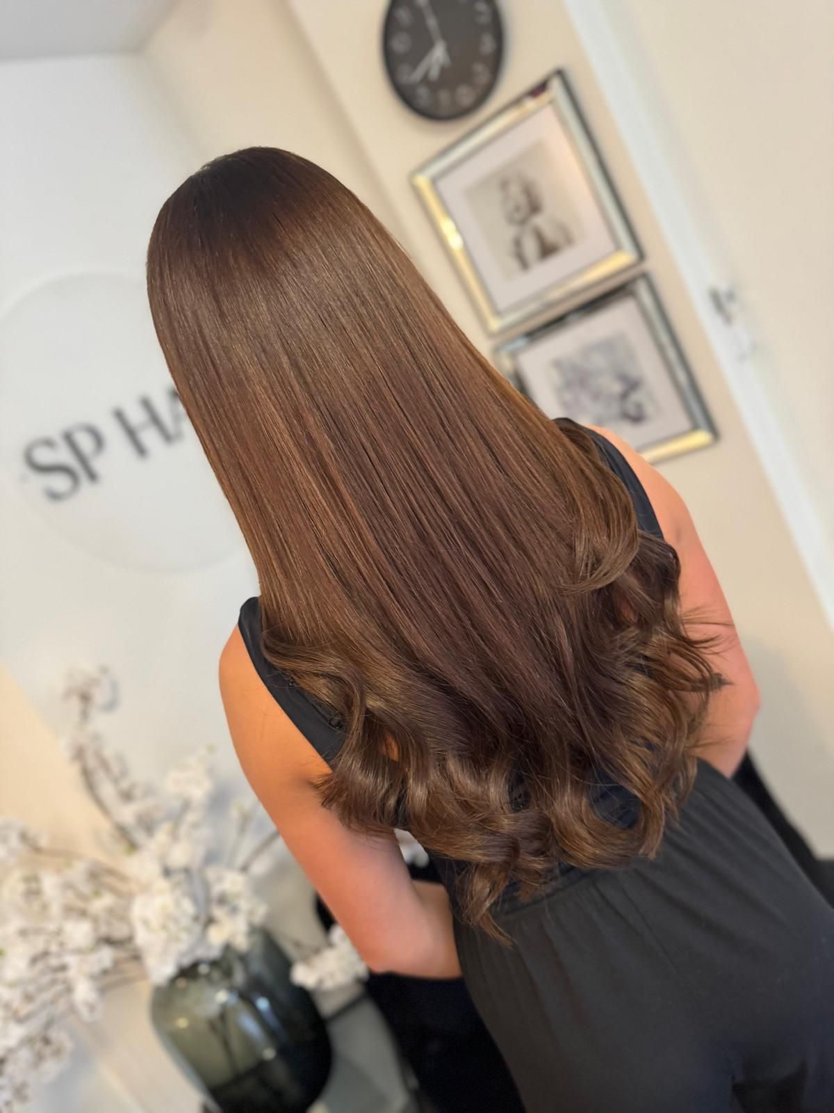 Tevreden klant na het plaatsen van de nieuwe extensions