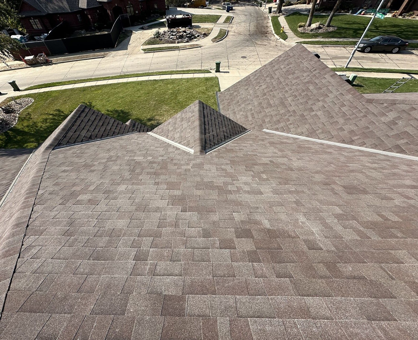An aerial view of a roof with a pyramid shaped roof.