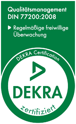 Ein grünes Schild mit der Aufschrift „Dekra-Zertifizierung“