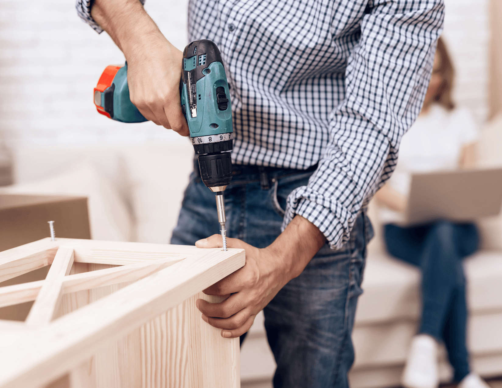 Handyman Abbotsford services installing a cabinet