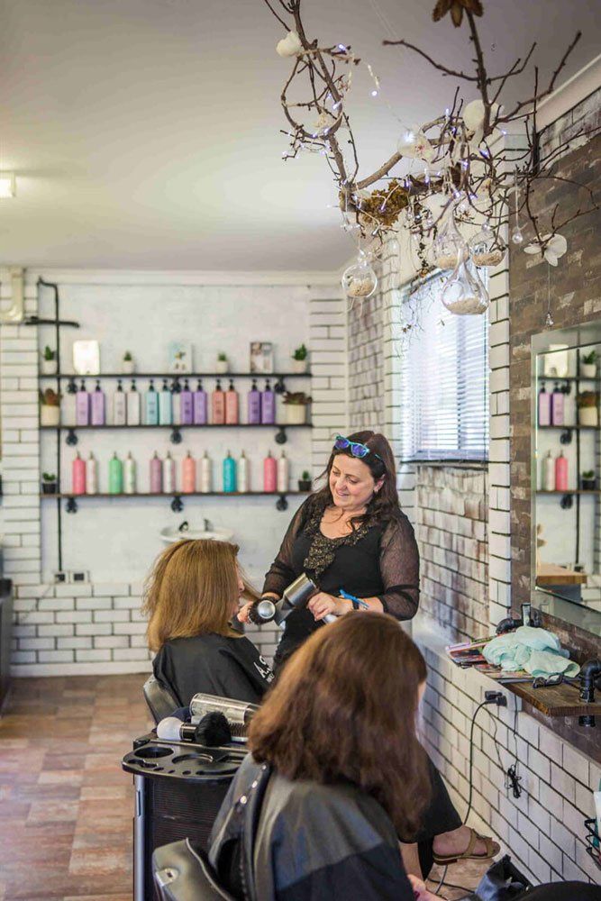 Hairdresser With a Client — Hair Colour & Cuts in Maleny, QLD