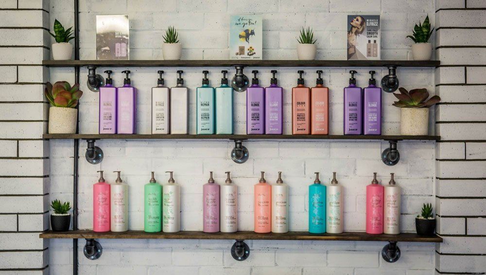 Various Hair Products at the Salon — Hair Colour & Cuts in Maleny, QLD