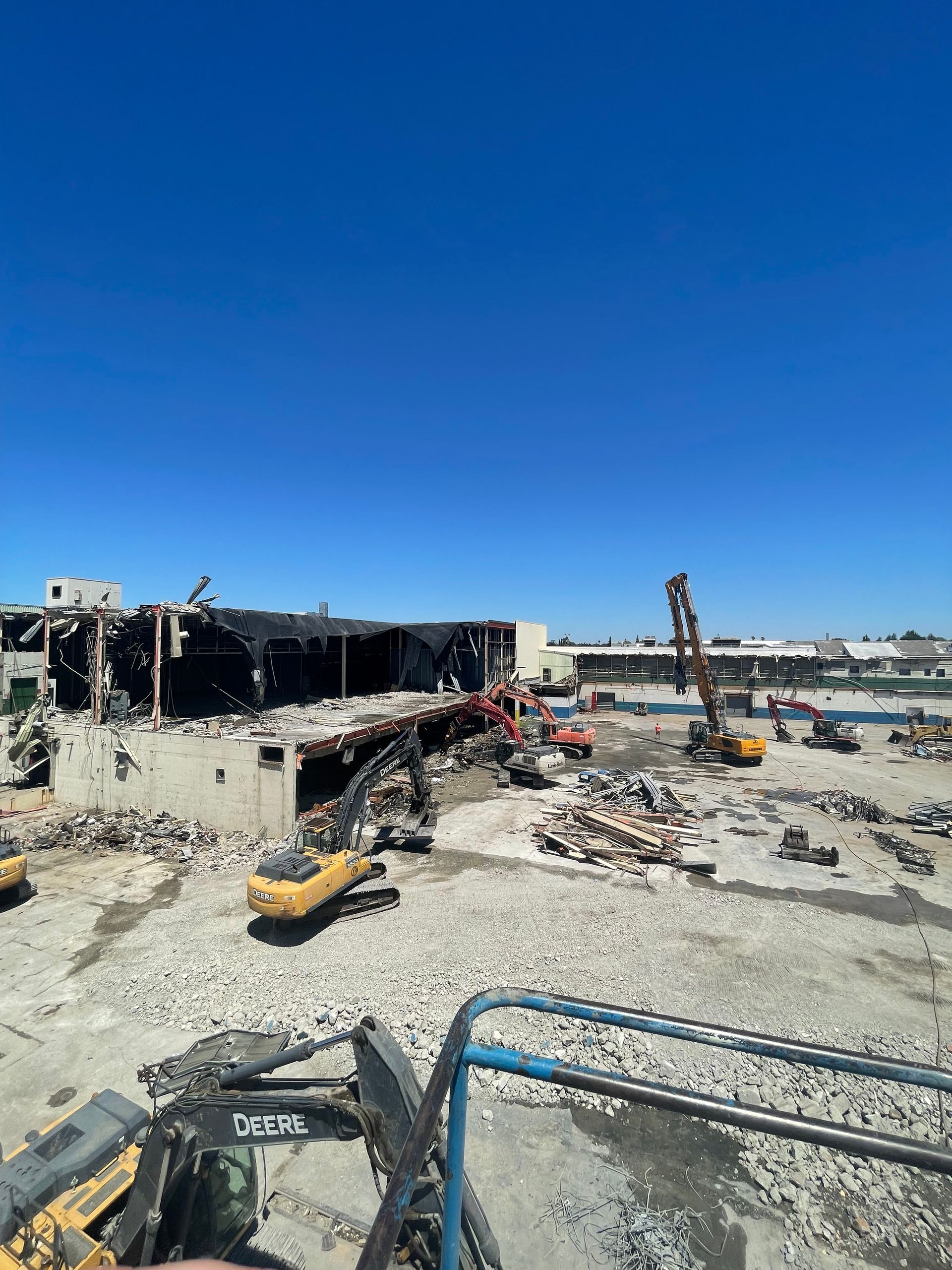 A Large Building Is Being Demolished With a Lot of Machinery — Chicago, IL — Sterling Holloway Demolition