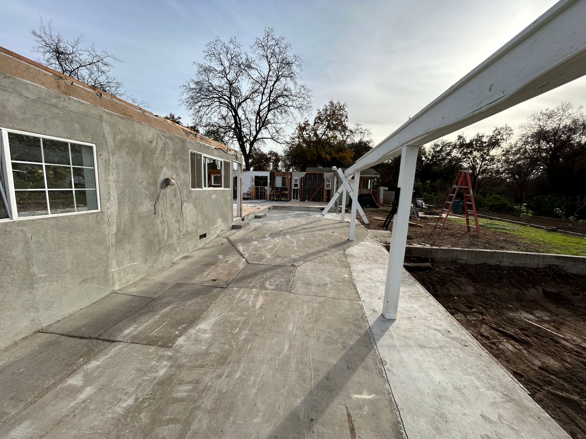 A Concrete Walkway Leading to a House Under Construction  — Chicago, IL — Sterling Holloway Demolition