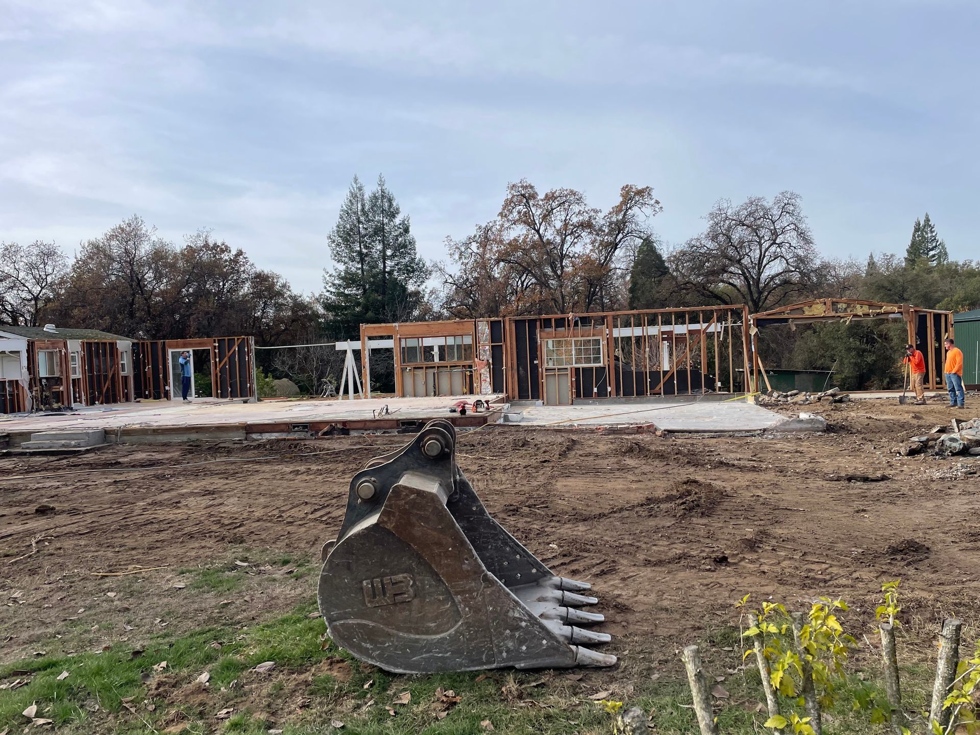 A Large Excavator Bucket in the Middle of a Construction Site — Chicago, IL — Sterling Holloway Demolition
