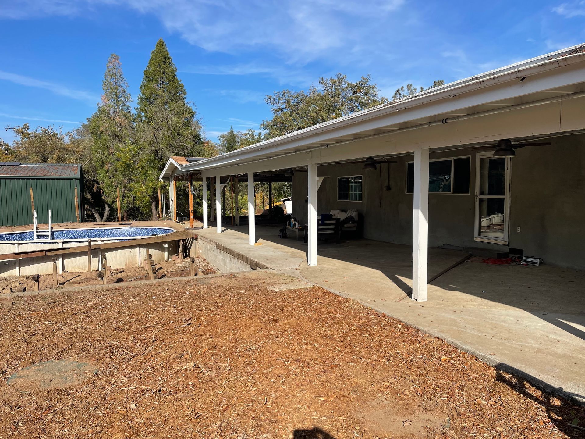 A House With a Covered Patio and a Pool in the Backyard — Chicago, IL — Sterling Holloway Demolition
