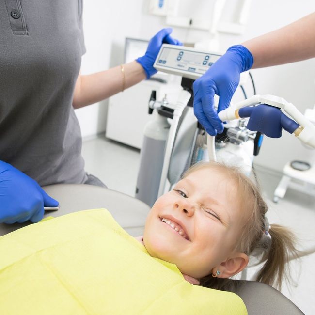 Child receiving dental treatment in Michigan City Indiana