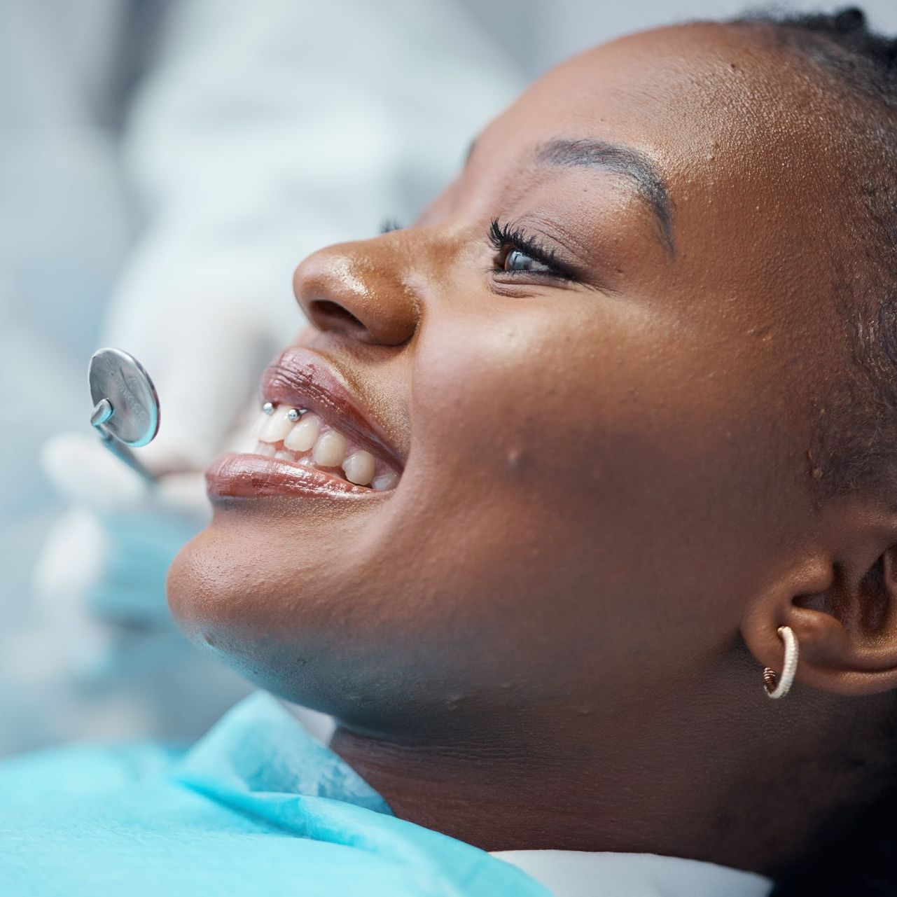 woman getting a dental cleaning in Michigan City, Indiana