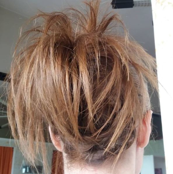 Acconciatura con capelli raccolti e trucco sposa