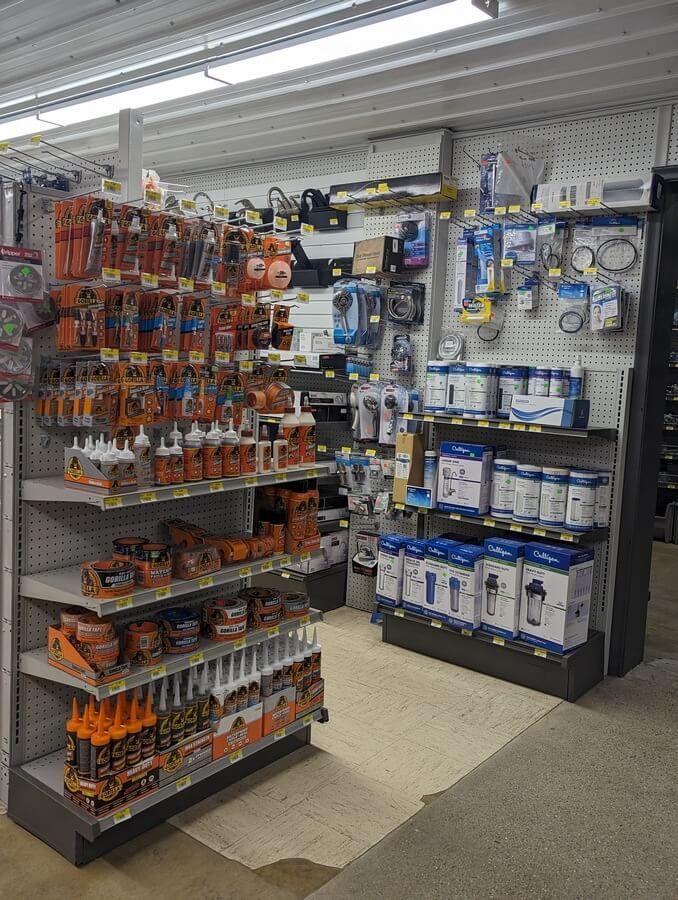 A store filled with shelves filled with lots of tools and supplies.