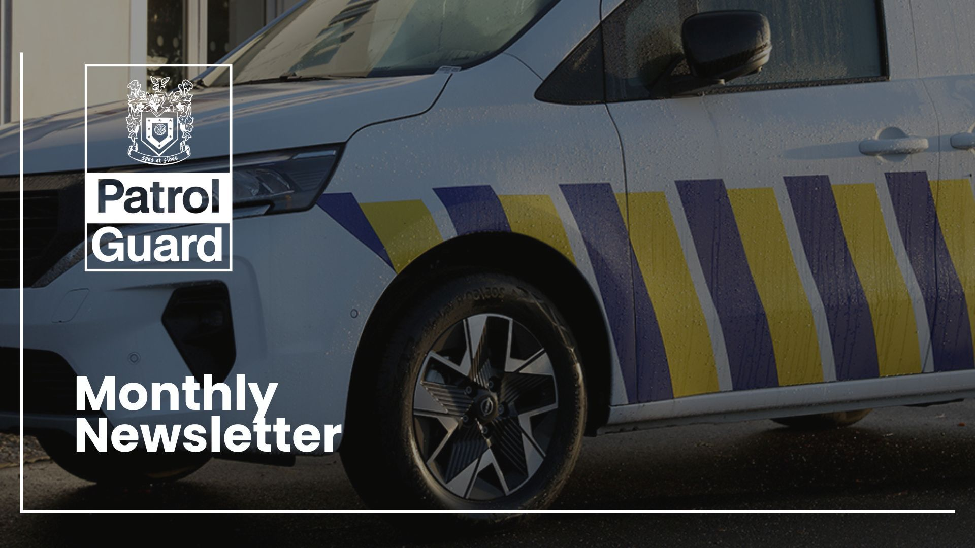A patrolguard van with the Monthly Newsletter title placed over it.