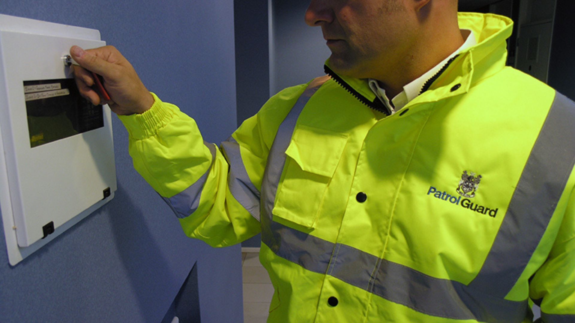 A PatrolGuard team member disabling an alarm.