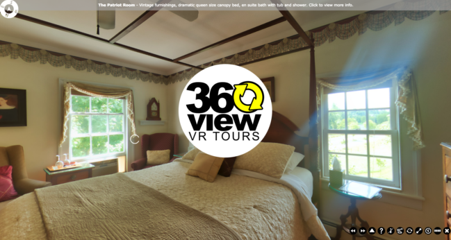 A 360 view of a bedroom with a canopy bed