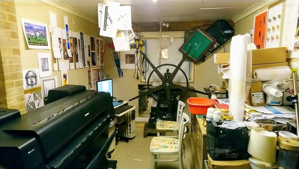 Picture of giclee printing workshop showing Canon Pro 4000 and  star wheel etching press